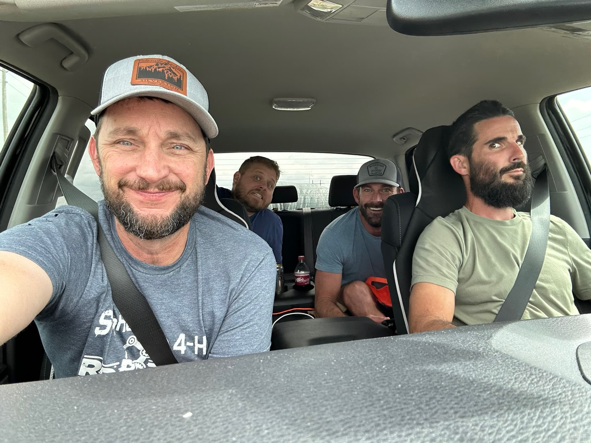 Four men piled into a car heading out